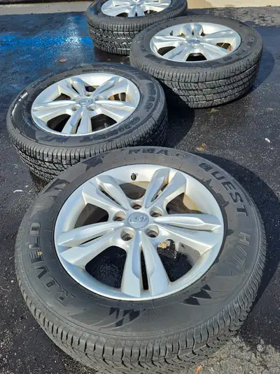 4 all season tires worn one season about 12k with OE aluminum alloy rims. Excellent shape