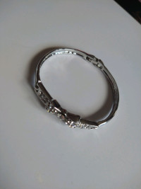 Silver Tone Bracelet with Bow with White Stones