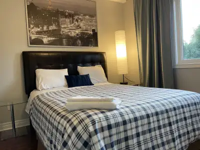 Quiet garden view room on second floor of detached house, one parking spot, laundry and kitchen shar...