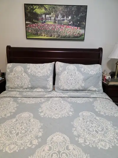 Custom made queen frame (headboard, footboard, and sideboard). Mattress ( 9 inches) is like new. Bes...
