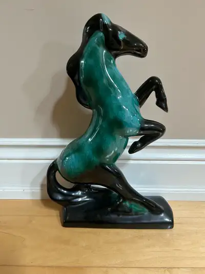 This is beautiful statue of Rearing Horse made by Blue Mountain Pottery. BMP was produced in Colling...