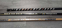 Ice hockey sticks and pucks