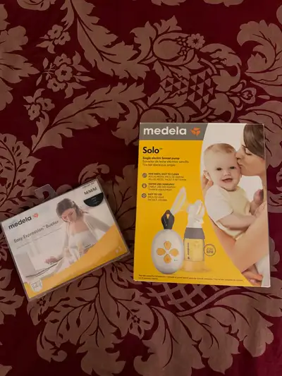 Breast pump in excellent condition, only used once then sterilized and put back in box since was no...