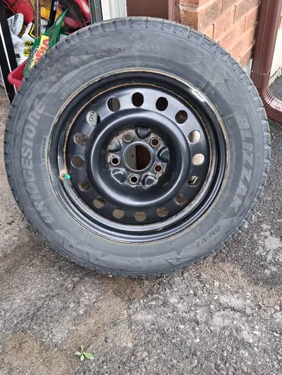 4 Bridgestone Blizzak winter tires on rims. 225/65 R17 Used 2 winters, lots of tread left