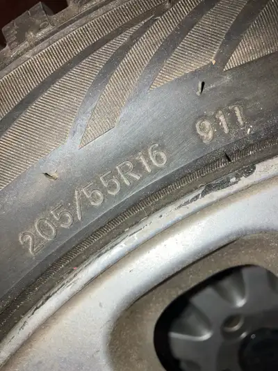 Studded Snow tires used one winter. Mounted on Volvo mags.