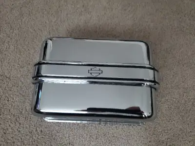 I have for sale a chrome electrical panel cover Harley part #66417-99a it fits 99 to 03 dyna may fit...