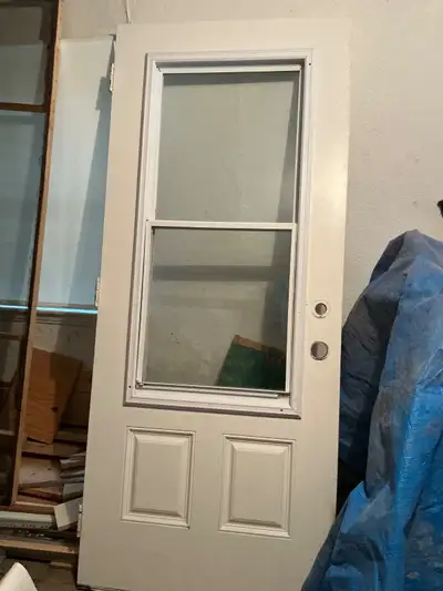 Entrance door with a clear sliding window, View more