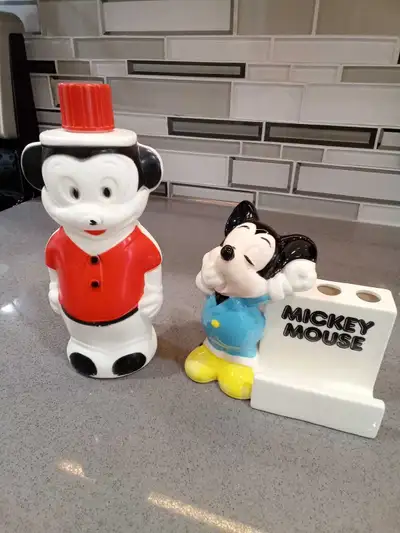 Vintage Mickey Mouse ceramic toothbrush holder & soapy bottle. Toothbrush holder could be used as a...