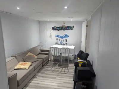 Spacious, semi-furnished basement featuring 1 bedroom, 1 bathroom, and a large living area (lobby)....
