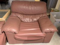 Dark pink loveseat and single couches