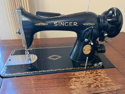 Singer Sewing Machine 15-91 with cabinet+multiple attachments , View more