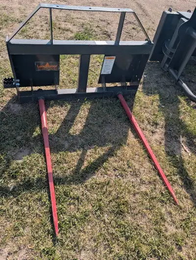 New! Landhonor Bale Spear w/quick attach plate. 2500lb rating Asking $1200 Contact 204-284-652three