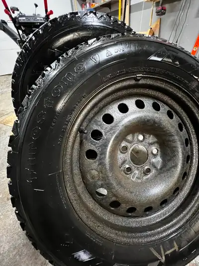 235/65/17 Firestone winter tires full set with steel rims