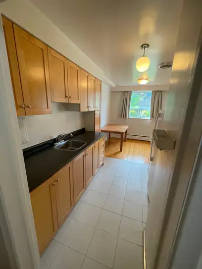 This charming 1-bedroom apartment is located on the lower floor of a six plex walk-up in a quiet nei...