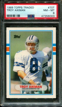 TROY AIKMAN … 1989 Topps Traded ROOKIE … PSA 8, 9 and 10 ($225)