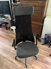 Ergonomic office chair with mesh backing