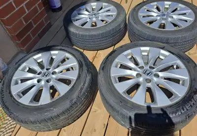 Used tires and rims. off my 2003 honda accord. 5 bolt pattern. Tires still have thread on them. two...