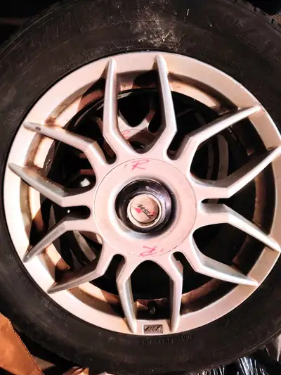 4 TSW R-System alloy rims. 5x114 bolt pattern. The specs stamped inside the rims: 7JX16H2 / 7016ZEN...