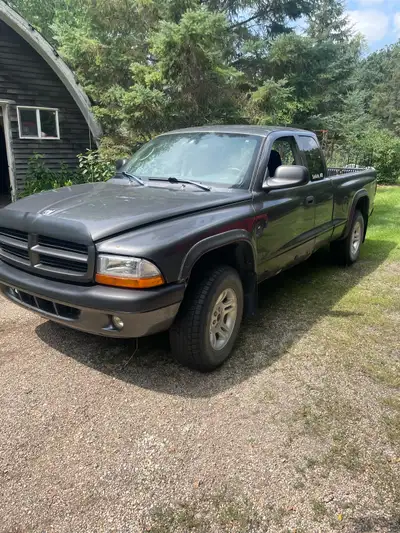 2003 Dakota 3.9L V6 4x4 Truck has 310k on it. Runs and drives. Best used as a parts or project vehic...