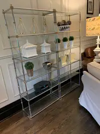 Glass and chrome bookshelves or display cases 