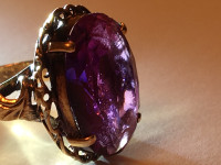 Yellow gold ring 18K . Size 6.. Oval faceted purple synthetic sa