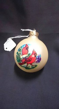 Cardinals on a White Glass Christmas Ornament