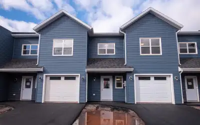 Three bedroom plus den 2 1/2 bath townhouse available now just off McEwen Road in summerside built i...