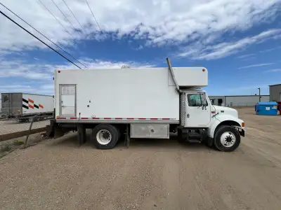 I'm selling a used steamer work truck that comes equipped with a crane integrated into the bumper fo...
