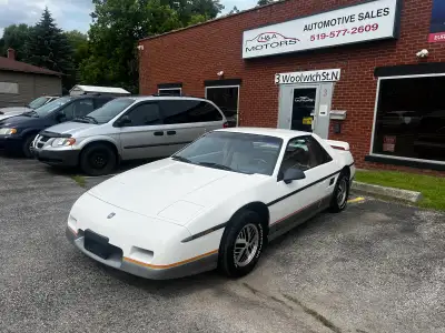 1985 Pontiac Fiero GT. 2.8 liter V6 with a 4 speed manual transmission and 83,000 original klms. Run...