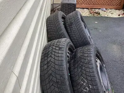 Michelin winter tires with rims 235/45/R18. Bolt pattern is 5 x 114.3