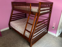 Bunk beds with 2 mattresses (like new)