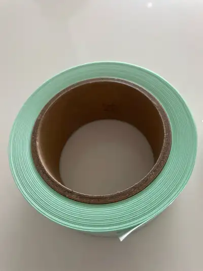 New, unused see-through heat sealable roll for sterilization or autoclave use About 2” wide