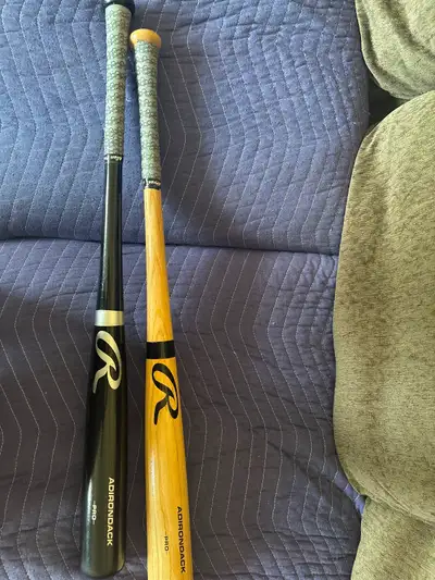 Two wood Rawlings baseball bats, never used,, View more