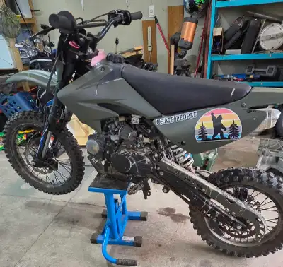 This pre-owned TaoTao 125cc dirt bike is ready for your next off-road adventure, featuring a rugged...