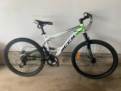 CCM Apex mountain bike (26” wheels). Dual suspension, lightweight aluminum frame, front/rear wheel q...