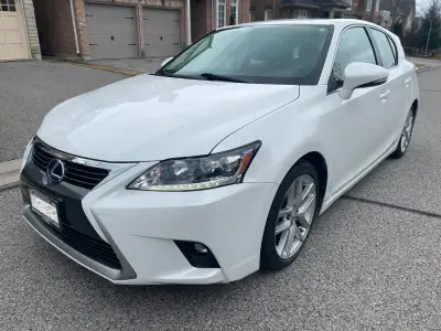 The 2014 White Lexus CT200h (touring package) is a compact luxury hybrid hatchback and similar to Pr...