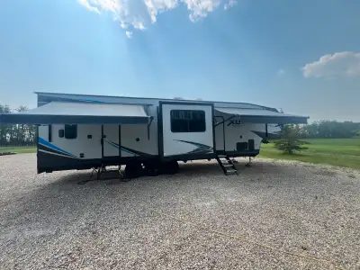 We are selling our 2020 XLR boost toy hauler. ( Or trade for a motorhome) •Length with hitch is 39’....