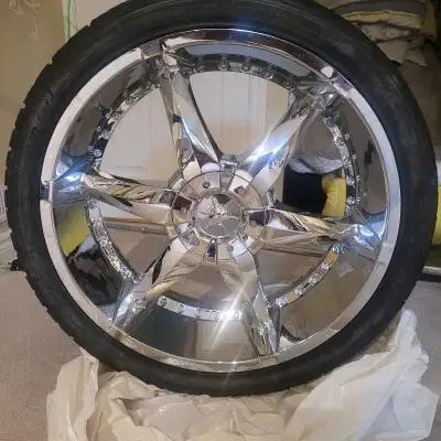 Set of 24" chrome rims with tires, fits Chev Silverado's and GMC Sierra's and full size Chev and GMC...