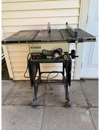 Delta Table Saw • retractable wheels • retractable table top on both sides
