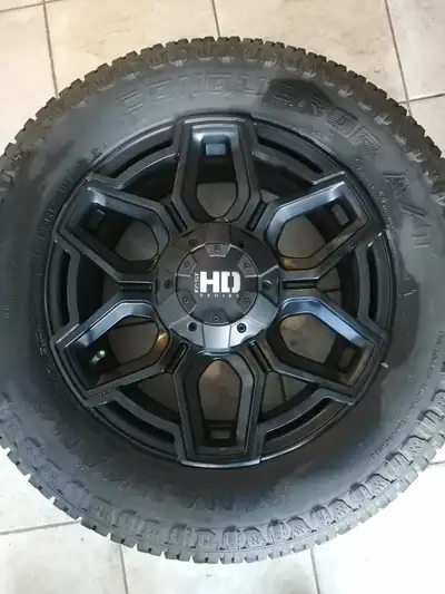 Rims are Thunder Matt black, 5 X 4.5" lug pattern. Tires are NANKANG CONQUEROR A/T SIZE OF TIRE IS 2...