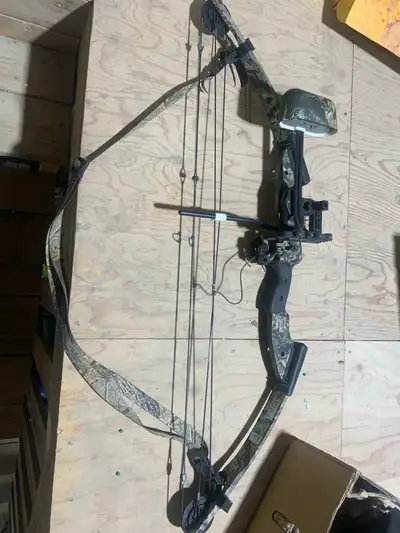 I'm selling a PSE compound bow, perfect for hunting or target practice. This bow is designed for a 2...