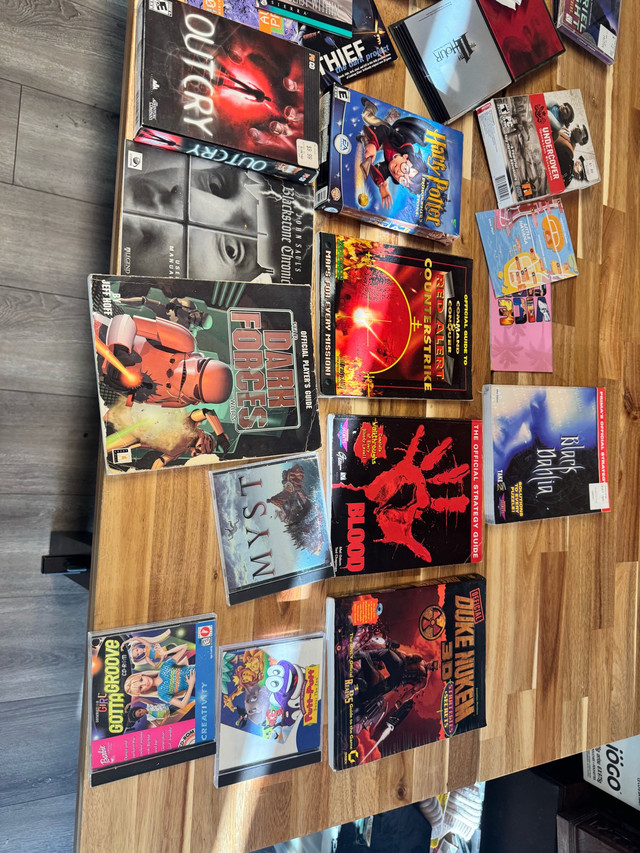 older pc games and book collections in Other in Ottawa