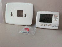Emerson thermostat, wall plate, screws/plugs still in package