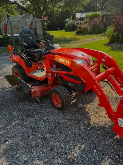 Kubota bx2370 Tractor, quick attach Bucket & Forks, View more