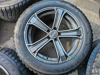 Selling set of 4 Bridgestone blizzak winter tires on alloy rims used on range rover sport 255/55/R20...