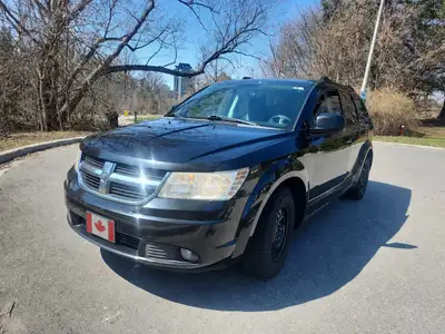 This is a used black Dodge Journey, ready for new adventures! While it has seen some road time, it's...