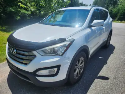 Selling a 2016 Hyundai Santa Fe Sport All-Wheel Drive (AWD) as-is. Total chassis mileage is 283,000...
