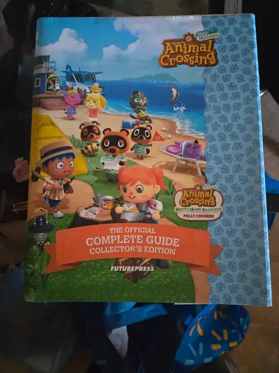 Animal crossing book for sale for those that play animal crossing this book is for you asking 25.00...