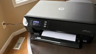 HP Envy 4502 excellent condition w ink refill kit $44, View more