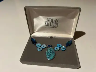 A Nolan Miller necklace  Glamour Collection, View more